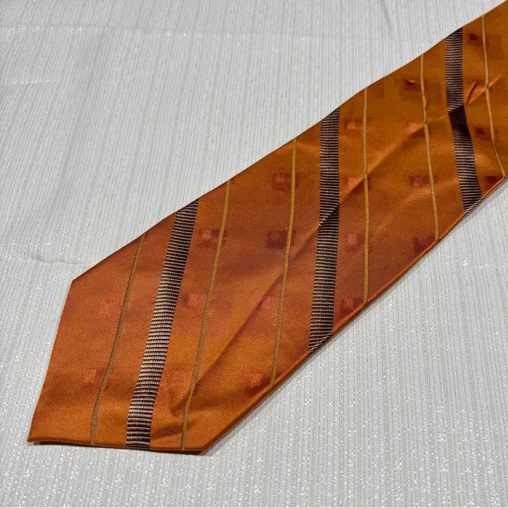 Handmade 100% silk tie by DONA orange and silver in color
